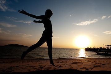 Image showing Jumping on the beach