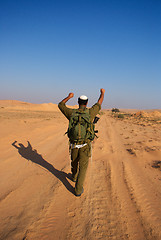 Image showing Israeli soldiers excersice in a desert