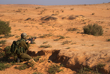 Image showing Israeli soldiers excersice in a desert
