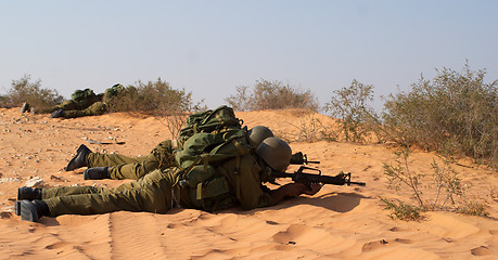 Image showing Israeli soldiers excersice in a desert