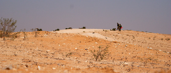 Image showing Israeli soldiers excersice in a desert