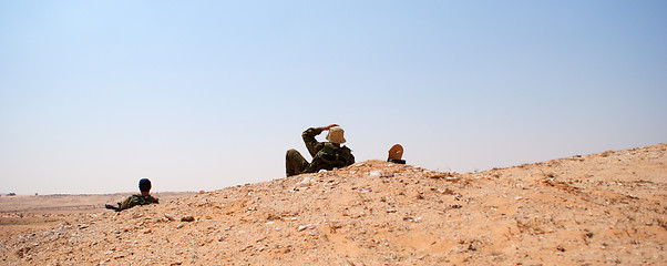 Image showing Israeli soldiers excersice in a desert