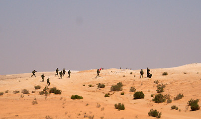 Image showing Israeli soldiers excersice in a desert