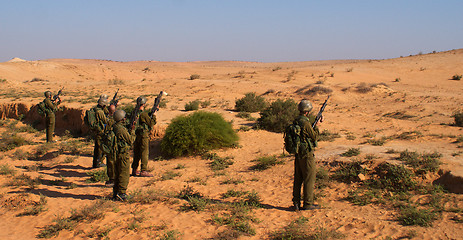 Image showing Israeli soldiers excersice in a desert