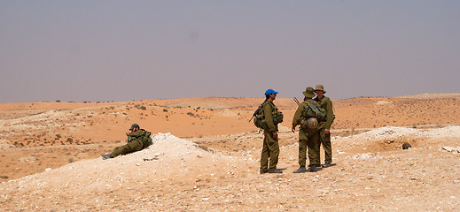 Image showing Israeli soldiers excersice in a desert