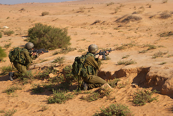 Image showing Israeli soldiers excersice in a desert