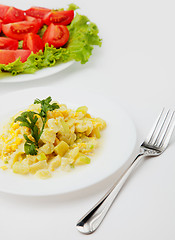 Image showing Fried zucchini with eggs