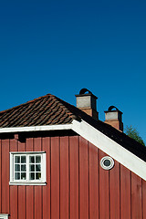 Image showing Detail of old, red house