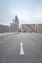 Image showing large numbered space parking lot 