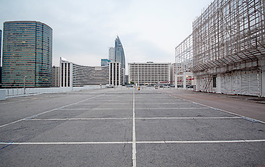 Image showing large numbered space parking lot 