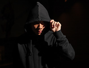 Image showing Monochrome picture of a guy in a hood 