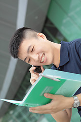 Image showing Portrait of businessman calling by phone 