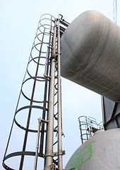 Image showing Stainless steel stairway in the tanks of a modern winery 