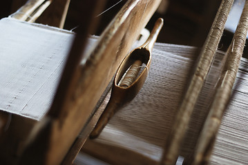Image showing shuttle on the antique loom