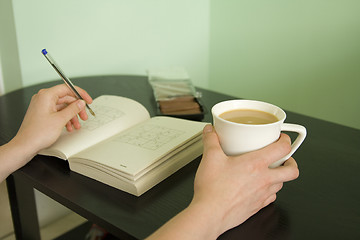 Image showing Doing the sudoku