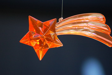 Image showing Red star on a string