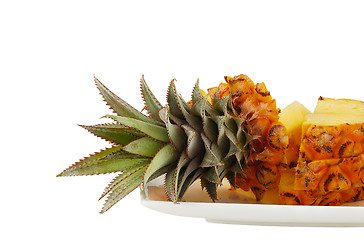 Image showing Sliced pineapple on white plate
