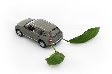 Image showing Green leaves and a car.Ecology conception