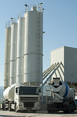 Image showing Cement factory and a truck loading cement