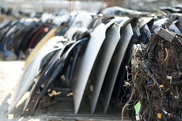 Image showing Old car parts and cables in automorgue