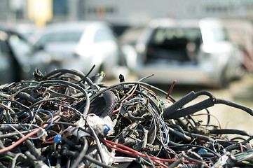 Image showing Old car parts and cables in automorgue