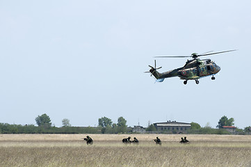 Image showing Military operation with helicopters