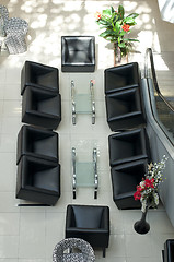 Image showing Luxurious black chairs in a bar