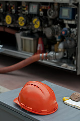 Image showing Fuel truck and helmet close up