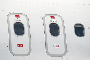 Image showing Windows of an airplane outside