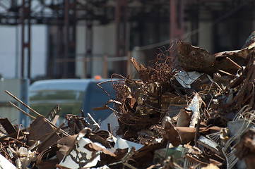 Image showing Pile of scrap iron and crane