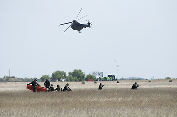 Image showing Military operation with helicopters
