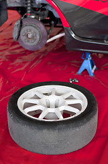 Image showing Changing a tire