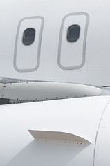 Image showing Windows of an airplane outside