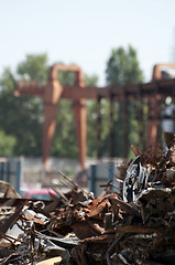 Image showing Pile of scrap iron and crane
