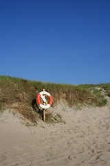 Image showing Rescue buoy at a beach