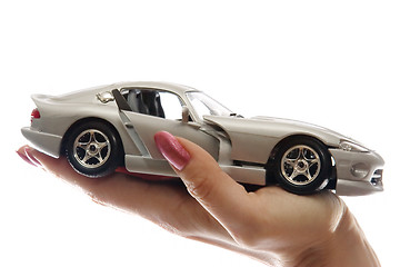 Image showing Car toy on palm