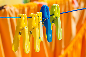 Image showing Washed clothes drying outside