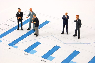 Image showing business man over economic chart