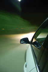 Image showing night drive with car in motion 