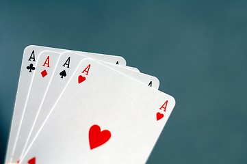 Image showing hand holding four aces