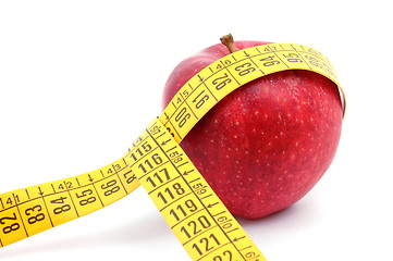 Image showing Apple and measuring tape on white