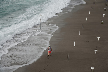 Image showing Walking along the coast