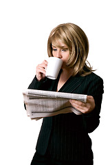 Image showing Business news and coffee