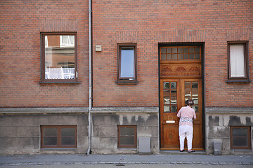 Image showing Front door cleaning