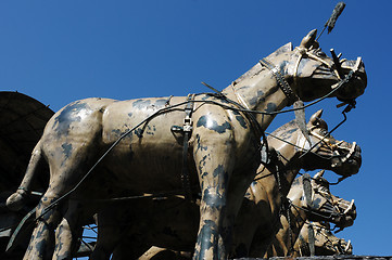 Image showing Painted bronze chariots and horses