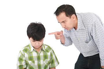 Image showing A father is threatening his little boy with a finger 