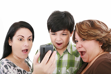 Image showing Young shock and surprise people watching the mobile phone