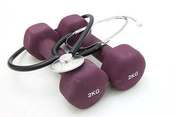 Image showing Stethoscope and dumbbell 