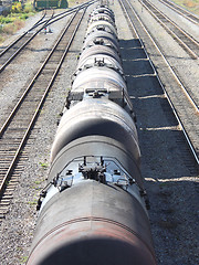 Image showing The train transports oil in tanks .