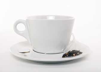 Image showing White cup of tea and teabag